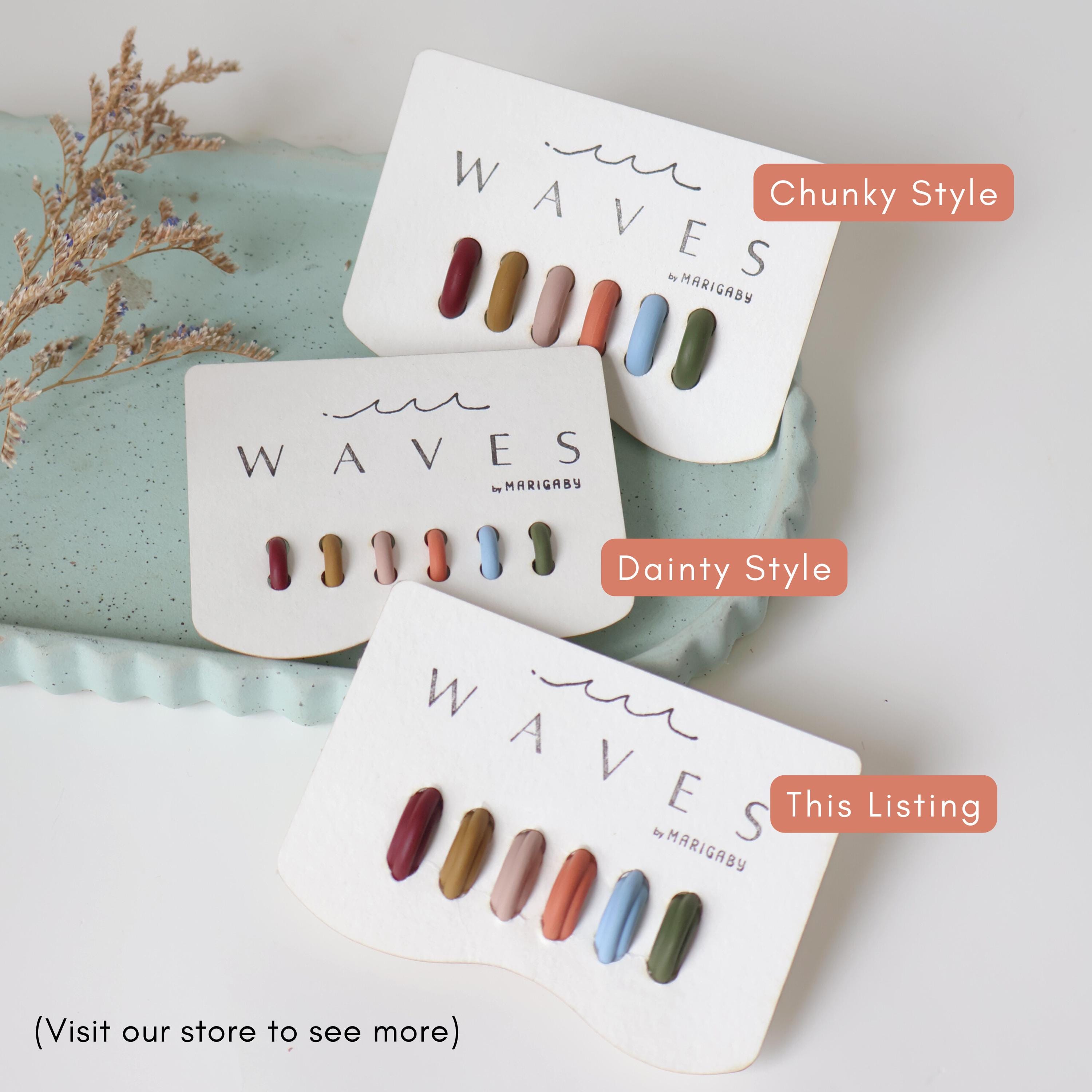 Bloom palette ear cuffs scattered on ceramic tray